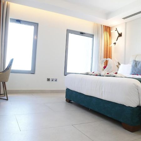 Waterfront Hotel Apartment Lusail Zewnętrze zdjęcie A room at the hotel