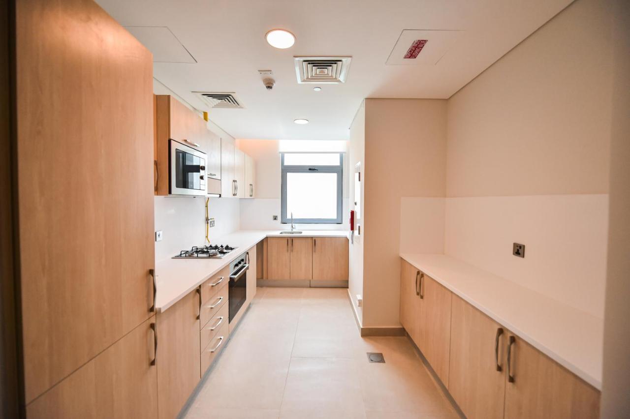Waterfront Hotel Apartment Lusail Zewnętrze zdjęcie A typical kitchen in a student flat