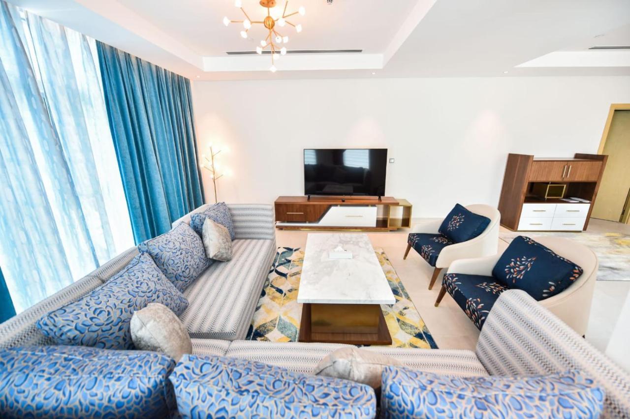 Waterfront Hotel Apartment Lusail Zewnętrze zdjęcie A living room in a luxury apartment