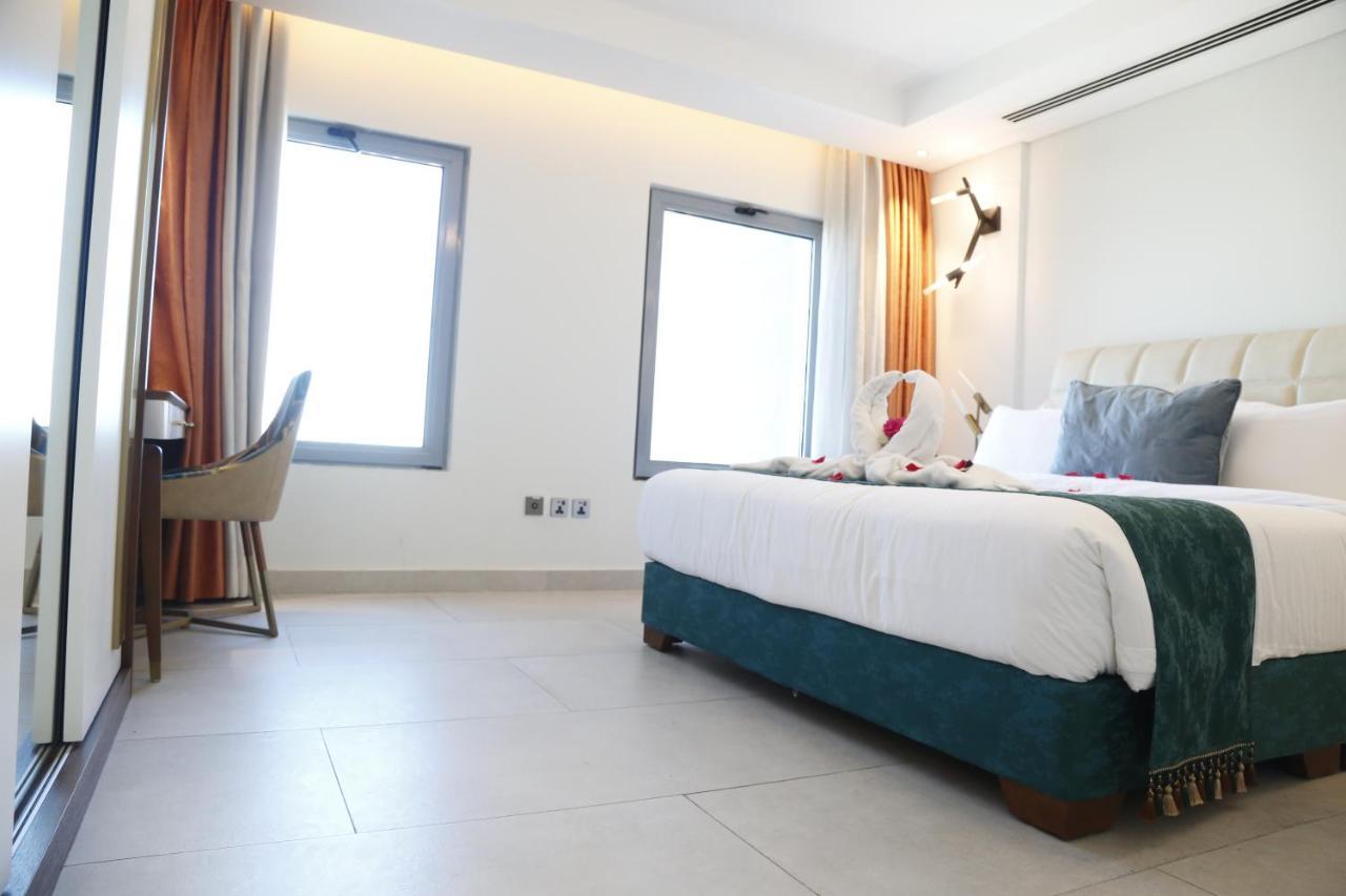 Waterfront Hotel Apartment Lusail Zewnętrze zdjęcie A room at the hotel
