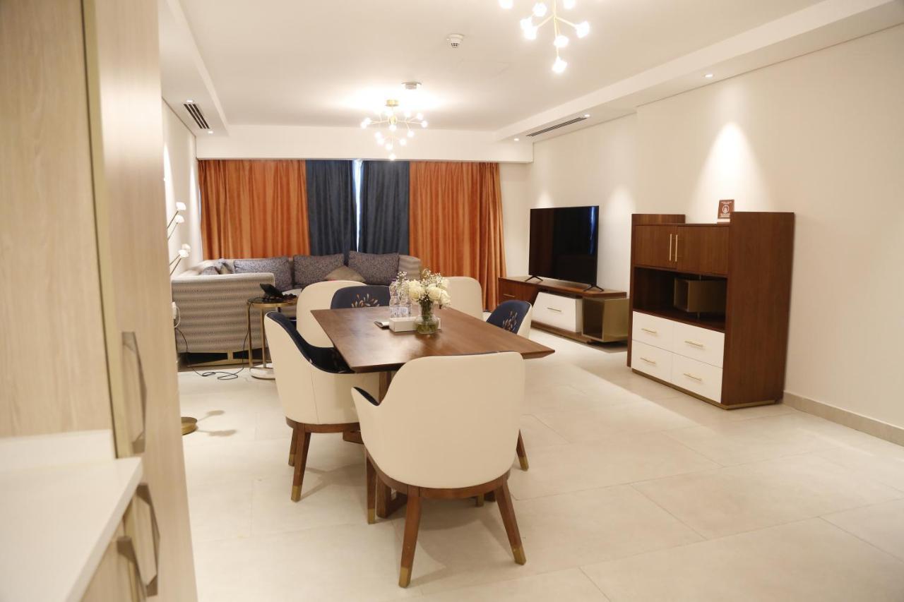 Waterfront Hotel Apartment Lusail Zewnętrze zdjęcie A living room in a typical apartment