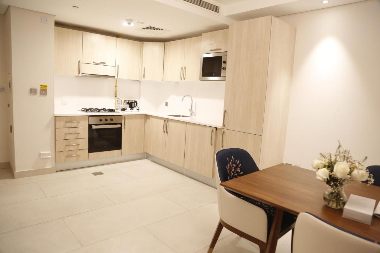 Waterfront Hotel Apartment Lusail Zewnętrze zdjęcie A kitchen in a serviced apartment in London